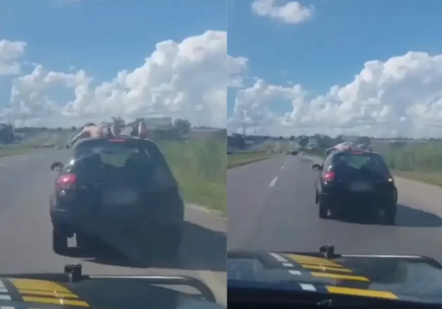 Homem sem roupas no teto do carro é flagrado em alta velocidade na BR-153, em Goiás [Vídeo]